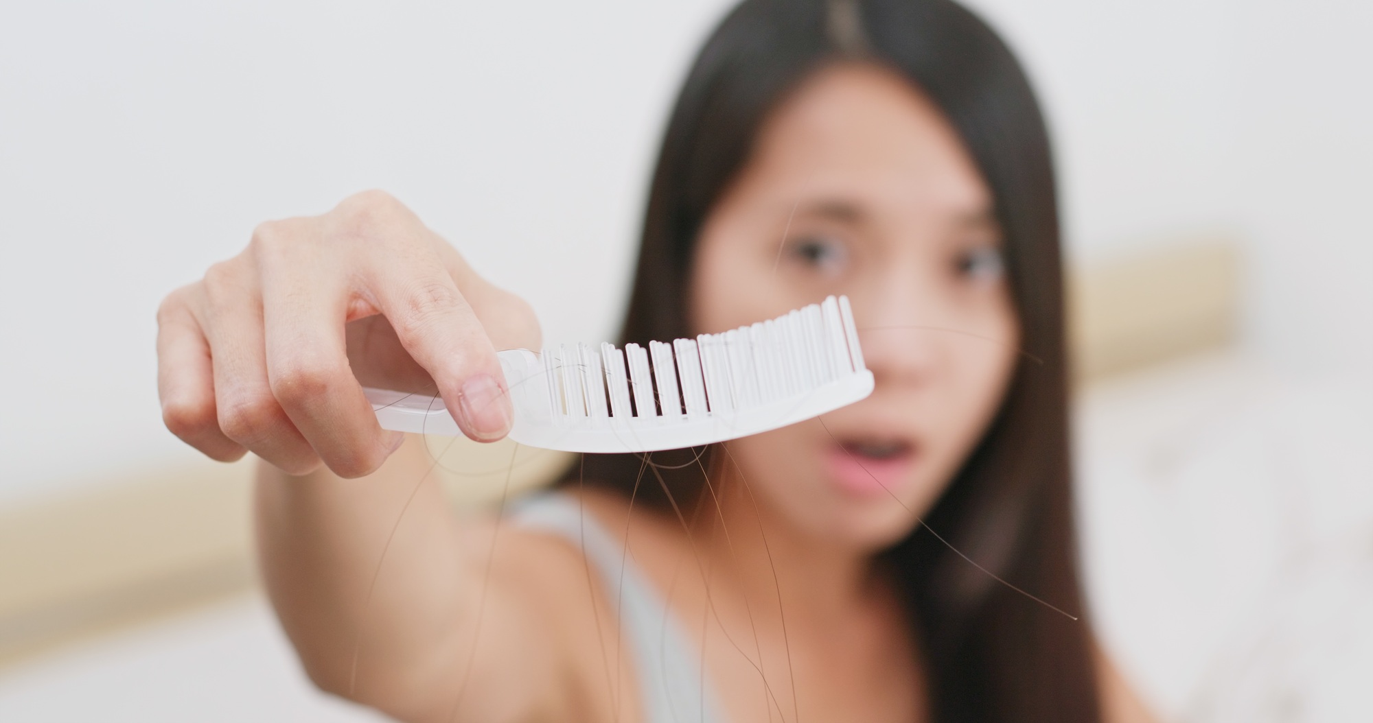 Woman suffer from hair loss