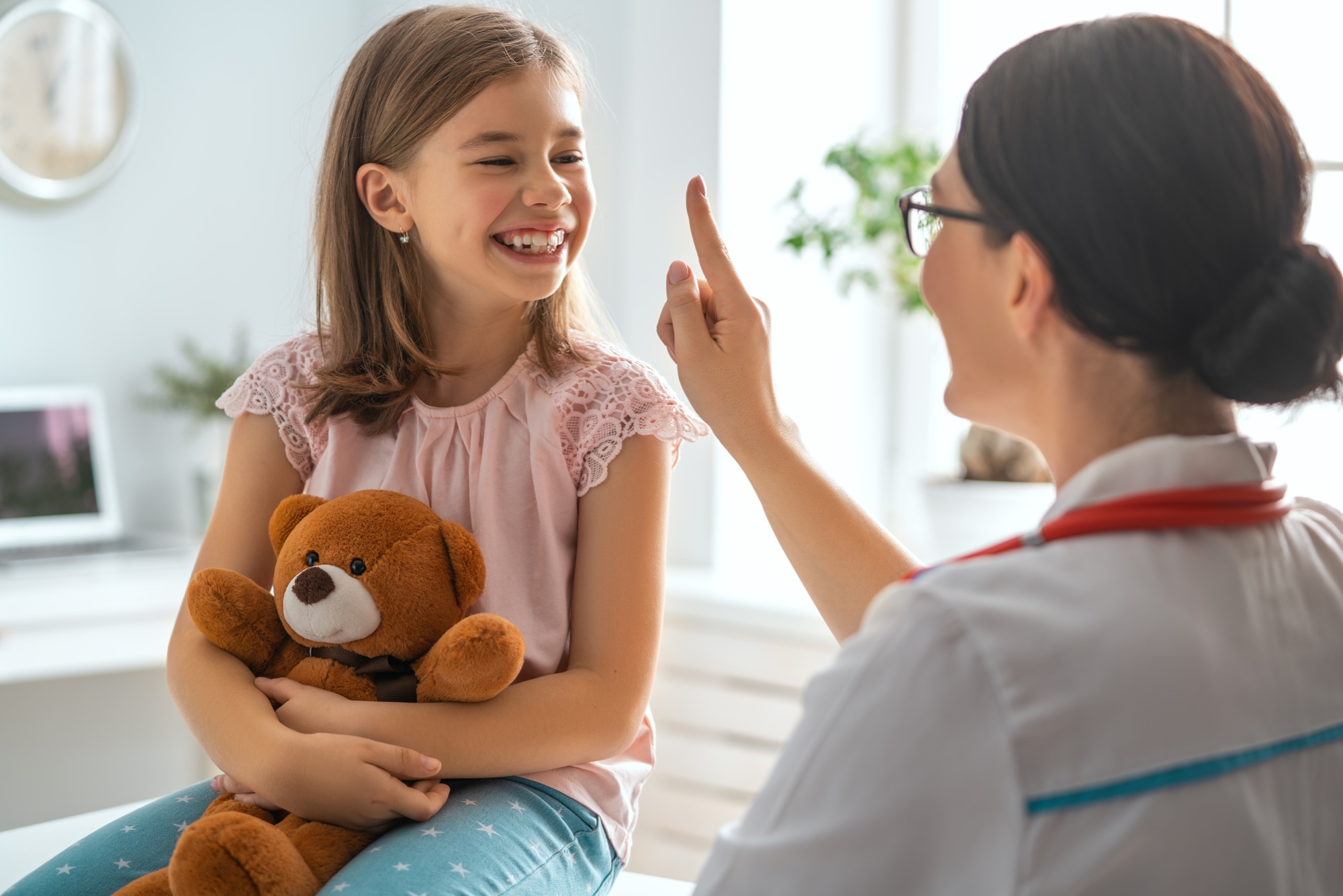 Doctor examining a child