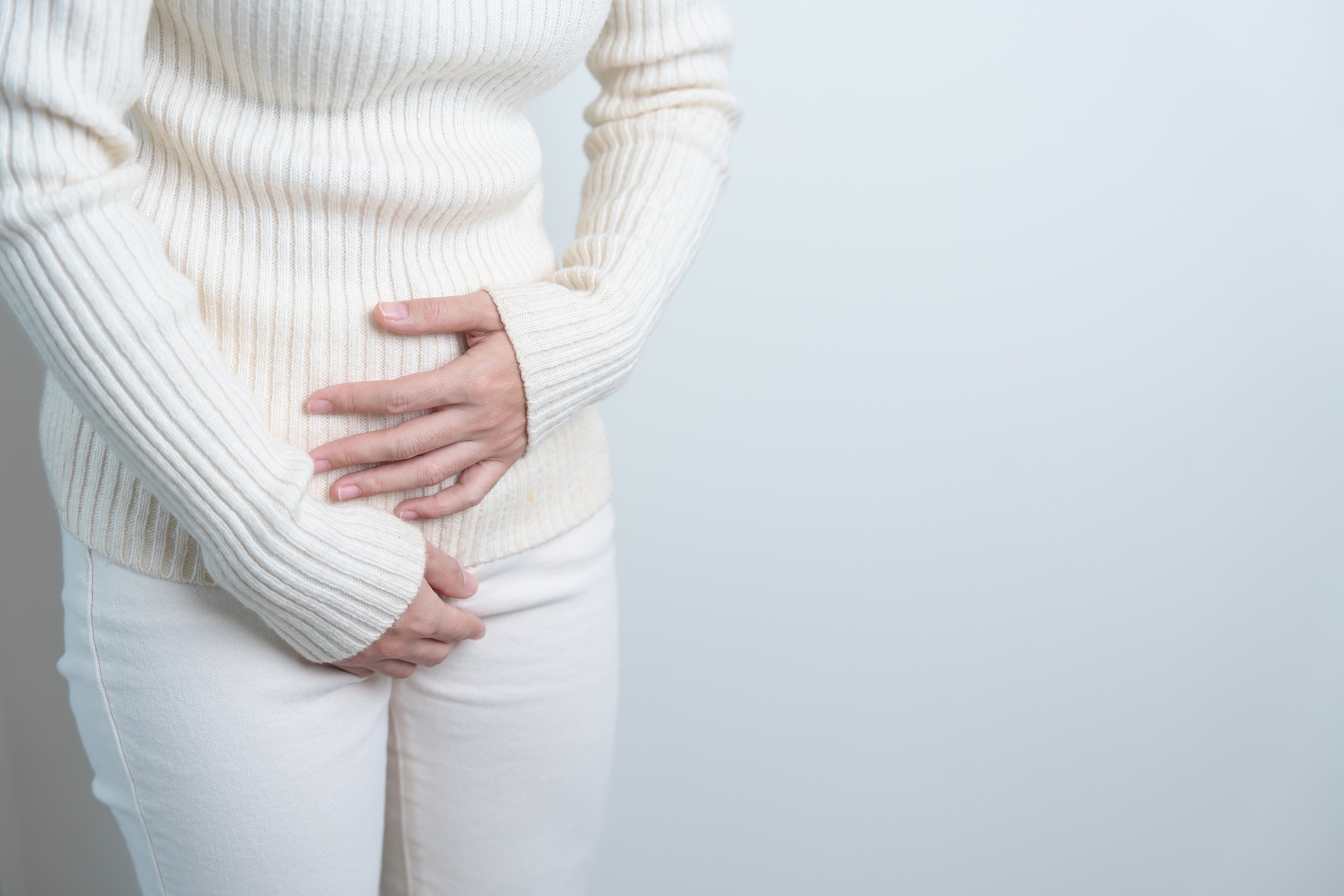 Woman having Stomach pain. Ovarian and Cervical cancer