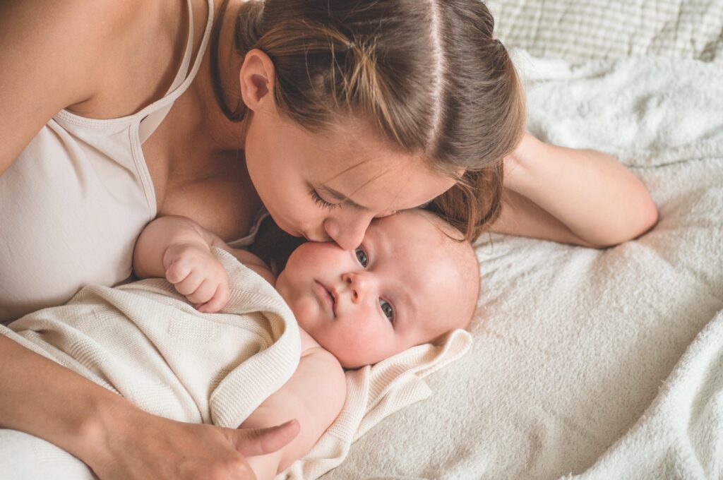 Portrait of a mom and breast feeding baby