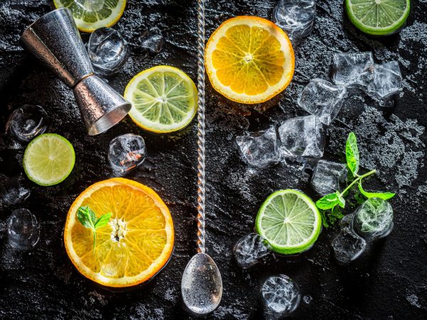 Bartender accessories with spoon and measure. Drink for summer heat.